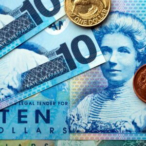 A mixture of New Zealand Bank notes and coins.
