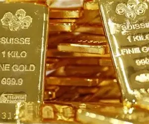 Gold Price Stays Below Multi-Week High as Trade Tensions Counter Fed Rate Uncertainty