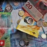 Japanese Yen Flat as BoJ Hawkishness Confronts Fed Rate Cut Projections