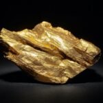 Gold Bounces Near Historic Highs on Safe-Haven Demand and Dovish Fed Projections Fueling XAU/USD